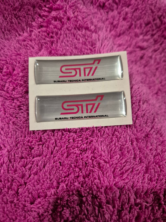 Replacement replica stickers for Oem Sti fuel cap cover.