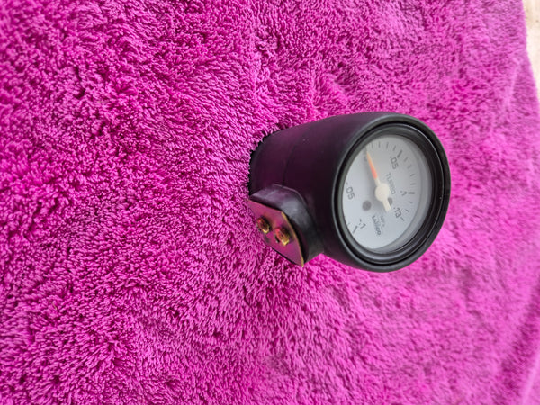 White Faced Lamco Boost Gauge Black face with housing.