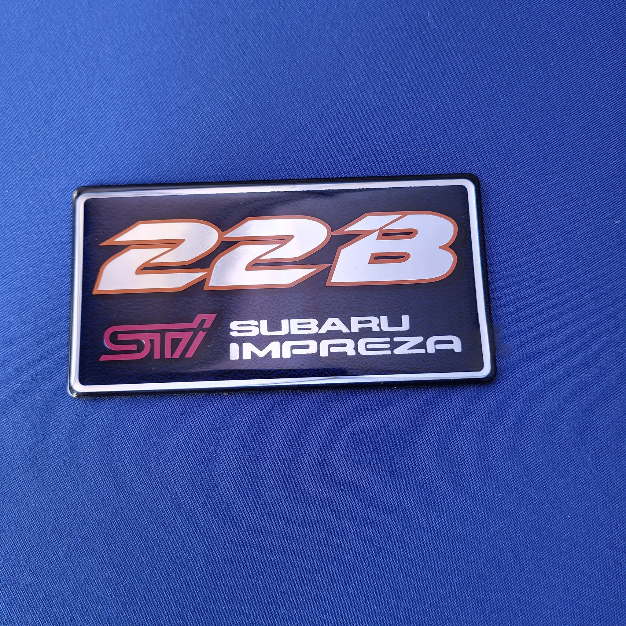 Genuine used OEM 22B boot badge 93080FA830